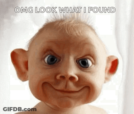 Baby Making Funny Face With Big Smile GIF