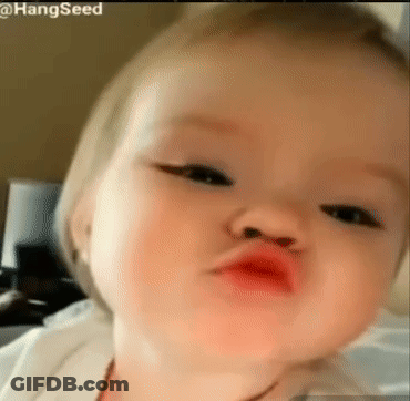 Baby Making Funny Face With Lips GIF