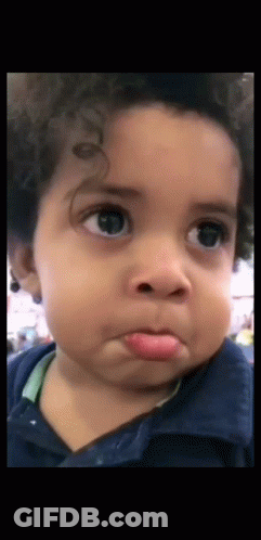 Baby Making Funny Face With Tongue Out GIF