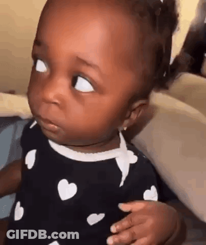Baby Making Funny Face GIF