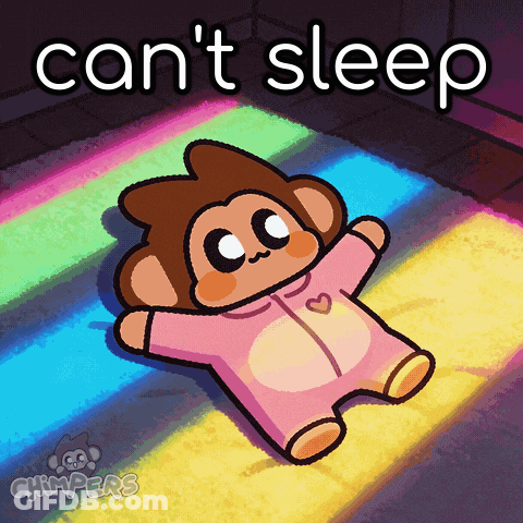 Baby Monkey Can't Sleep On Rainbow Rug GIF