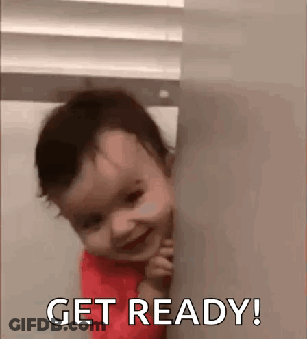 Baby Peeking Behind Wall Smiling Get Ready GIF