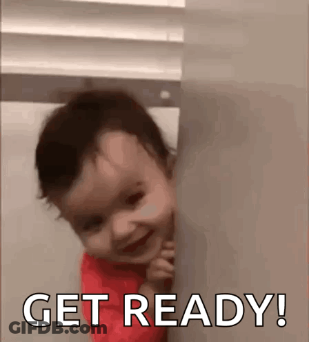 Baby Peeking From Behind Wall Saying Get Ready GIF
