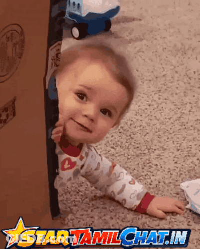 Baby Peeking Out Of Cardboard Box With Star Tamilchat.in Logo GIF