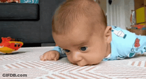 Baby Peeking Out Of Christmas Presents Grandma's House Be Like GIF