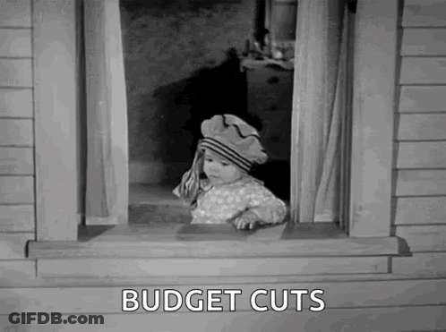 Baby Peeking Out Window Saying Budget Cuts GIF