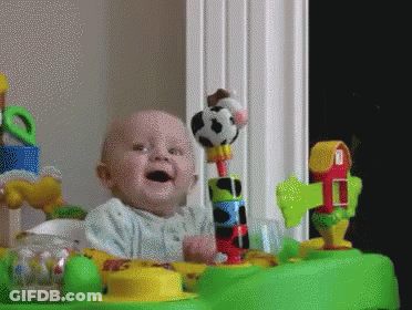 Baby Playing With Cow Toy GIF