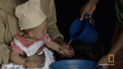 Baby Poured Water From Blue Pitcher Natgeotv.com GIF