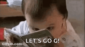Baby Reading Book Let's Go G GIF