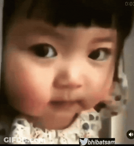 Baby's Face In Blurry Photo With Twitter Hashtag Bhibatsam GIF