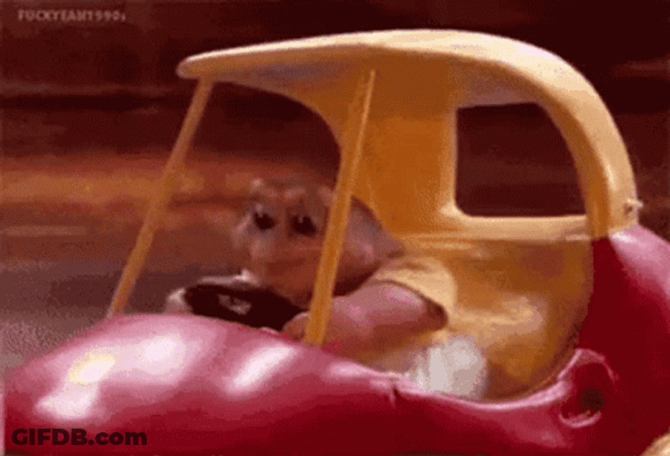 Baby Sinclair Driving A Fast Toy Car GIF