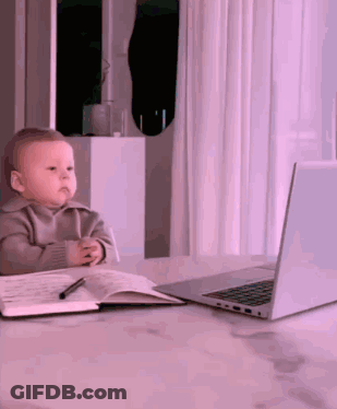 Baby Sitting At Desk With Laptop GIF