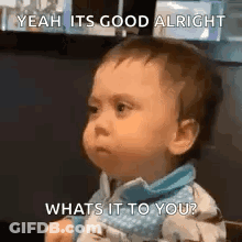 Baby Sitting At Table Saying Yeah Its Good Alright Whats It To You GIF