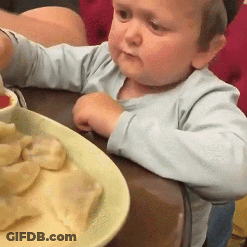 Baby Sitting At Table With Plate Of Food GIF