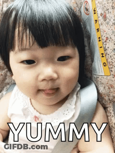Baby Sitting In Car Seat Saying Yummy GIF