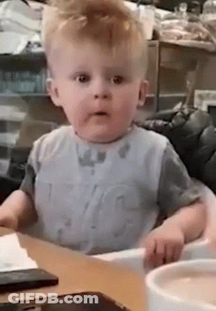 Baby Sitting In High Chair With Coffee GIF