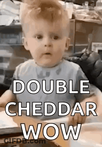 Baby Sitting In High Chair With Double Cheddar Wow GIF