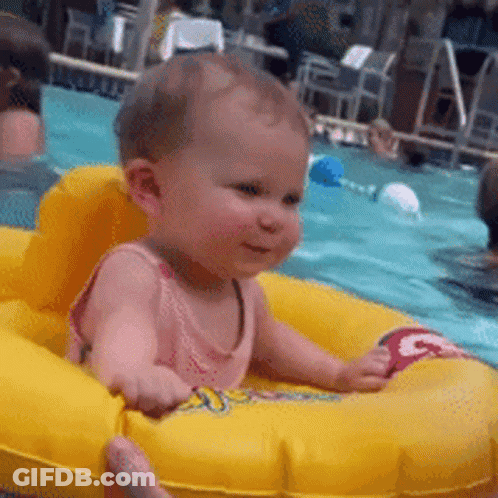 Baby Sitting In Yellow Raft In Swimming Pool GIF