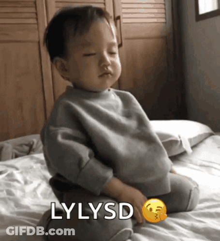 Baby Sitting On Bed With Lylysd GIF