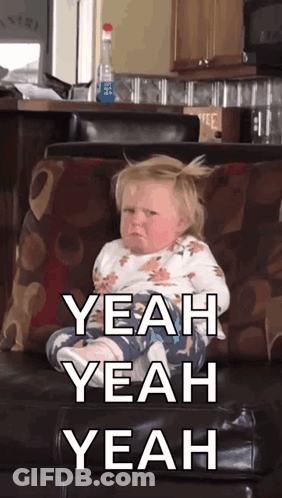 Baby Sitting On Couch Saying Yeah Yeah Yeah GIF