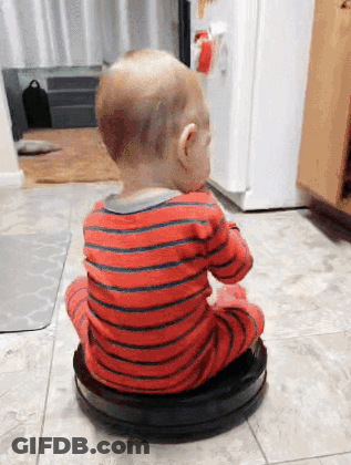 Baby Sitting On Vacuum Cleaner GIF