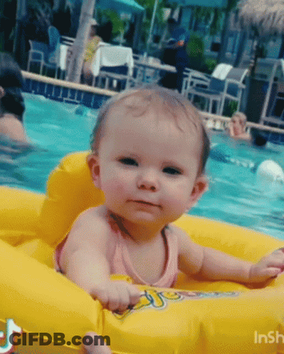Baby Sitting On Yellow Raft In Pool GIF