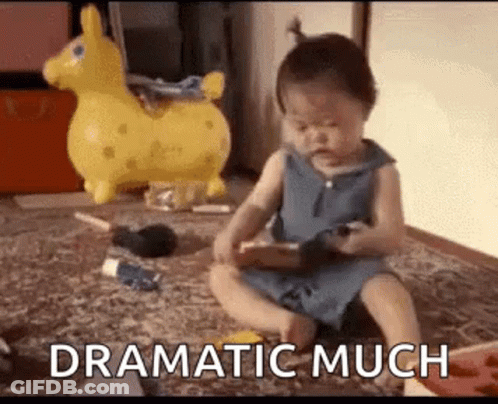 Baby Sitting Playing With Remote And Toy GIF