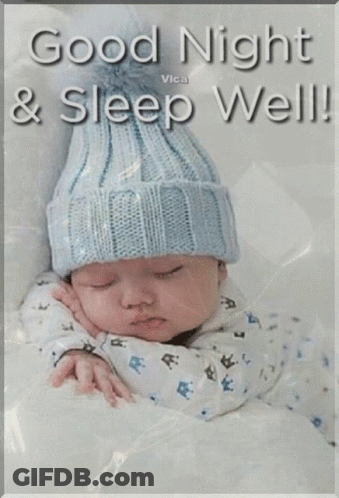 Baby Sleeping In Blue Knitted Hat GIF