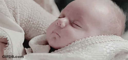 Baby Sleeping In White Blanket GIF