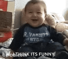 Baby Smiling In Varsity Byga Shirt GIF