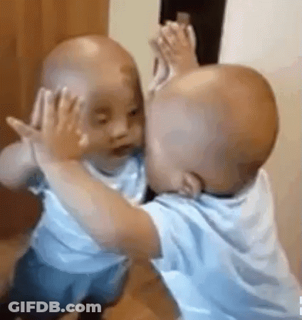 Baby Touching Face In Mirror GIF