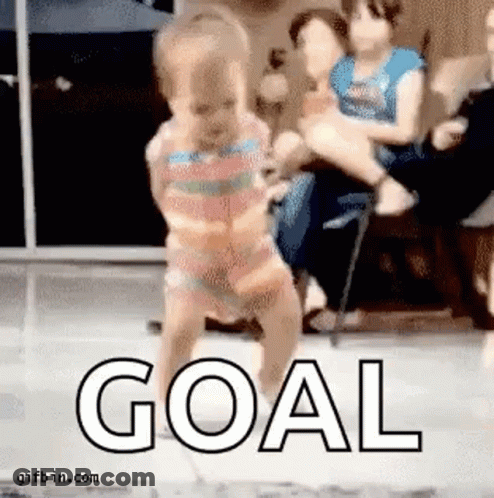 Baby Walking In Front Of Goal Sign GIF