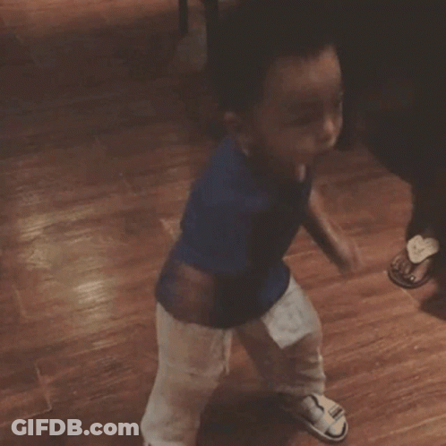 Baby Wearing Cute Since Day 1 Shirt On Couch GIF