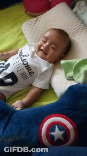 Baby Wearing Handsome Shirt Laying On Bed GIF