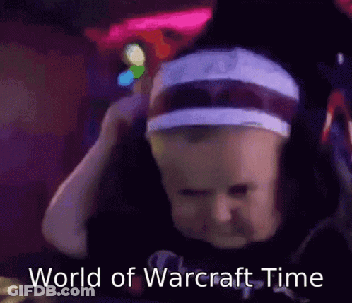Baby Wearing Headband And Hat Says World Of Warcraft Time GIF