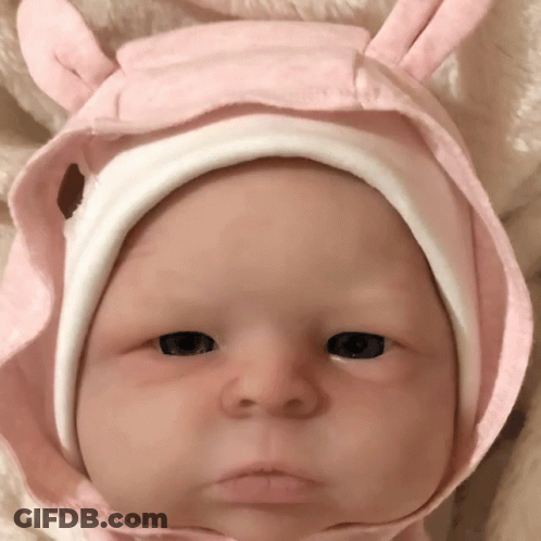 Baby Wearing Pink Hat With Ears GIF