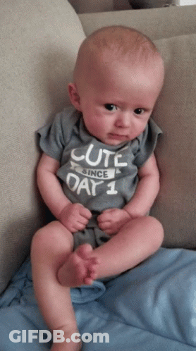 Baby Wearing Since Day 1 Shirt On Couch GIF