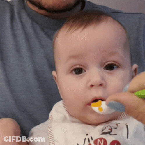 Baby With Bib Saying N GIF