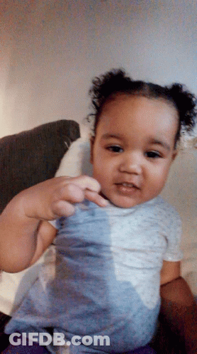 Baby With Curly Hair Sitting GIF
