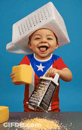 Baby With Grater On Head Holding Cheese GIF