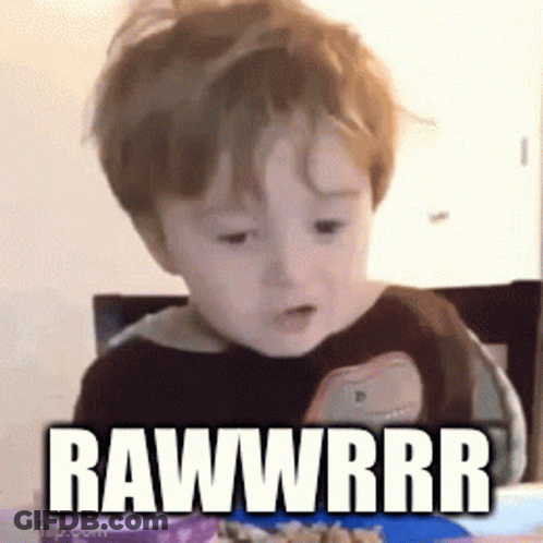 Baby With Plate Of Food Saying Rawwrrr GIF