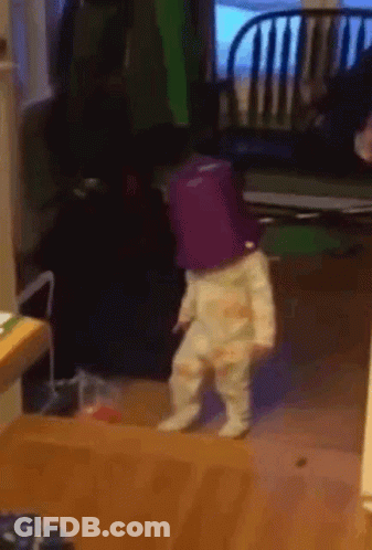 Baby With Purple Bucket On Head GIF