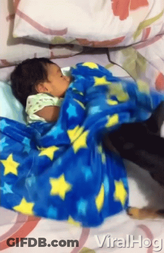 Baby Wrapped In Blue Blanket With Yellow Stars GIF