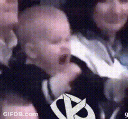 Baby Yawning In Black Shirt With Star GIF