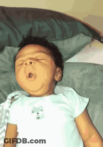 Baby Yawning In White Shirt With Wolf GIF