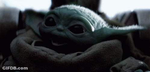 Baby Yoda Being Held In Blanket GIF