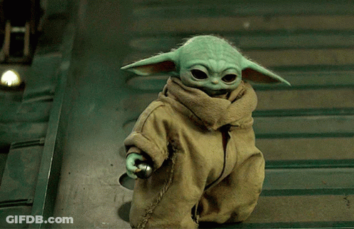 Baby Yoda Doll Standing On Staircase GIF