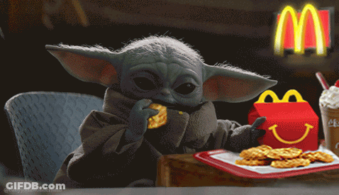 Baby Yoda Eating Waffle Next To Happy Meal GIF