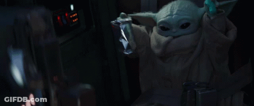 Baby Yoda Holding Food Bag GIF