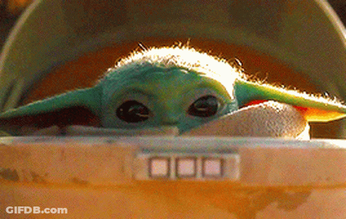 Baby Yoda In A Helmet Close-Up GIF